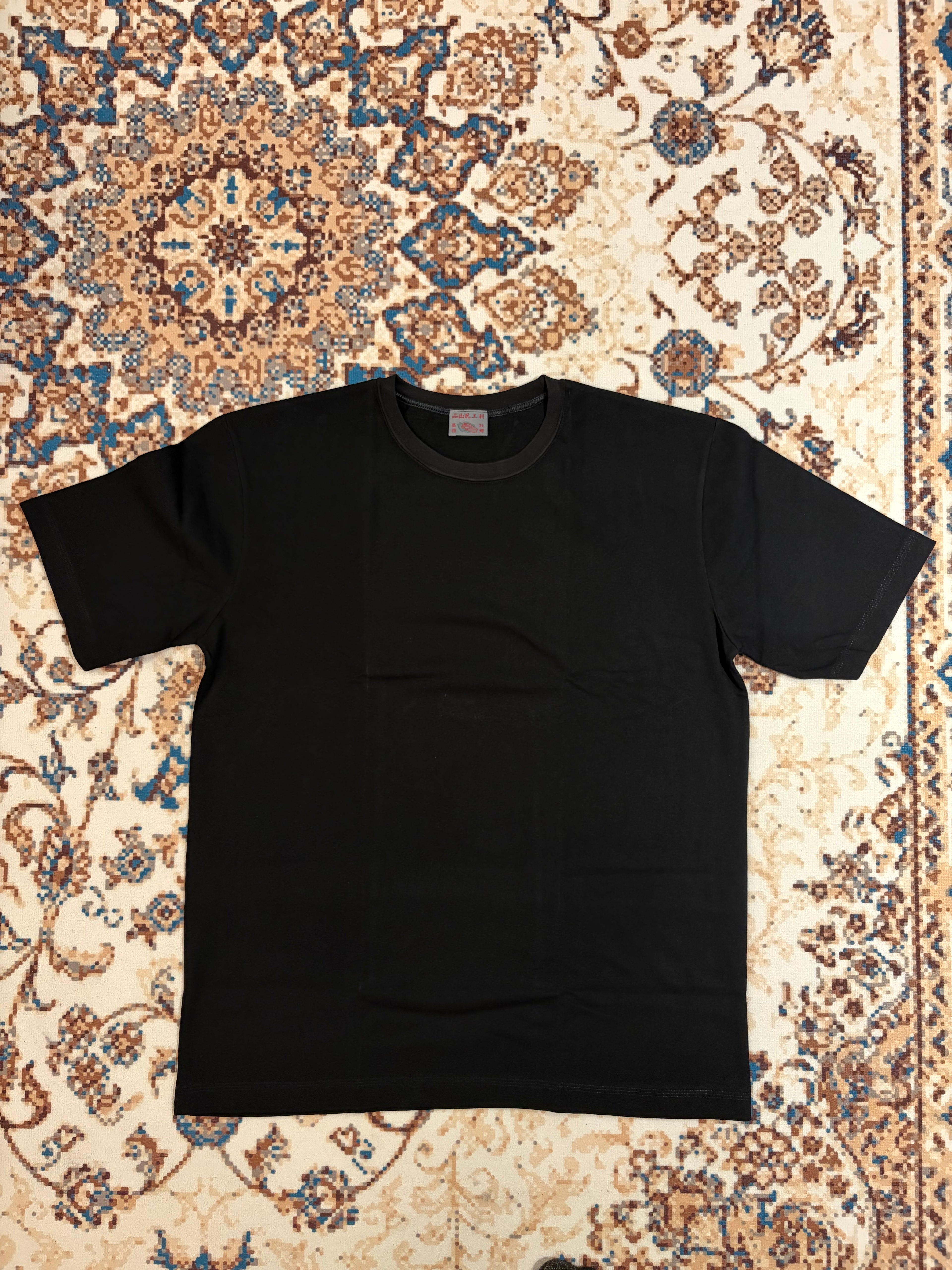Lee Kung Man Made in Hong Kong 
Black tee