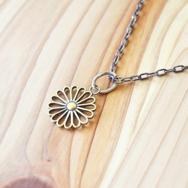 Kikumon Charm “SUKASHI” Medium Brass