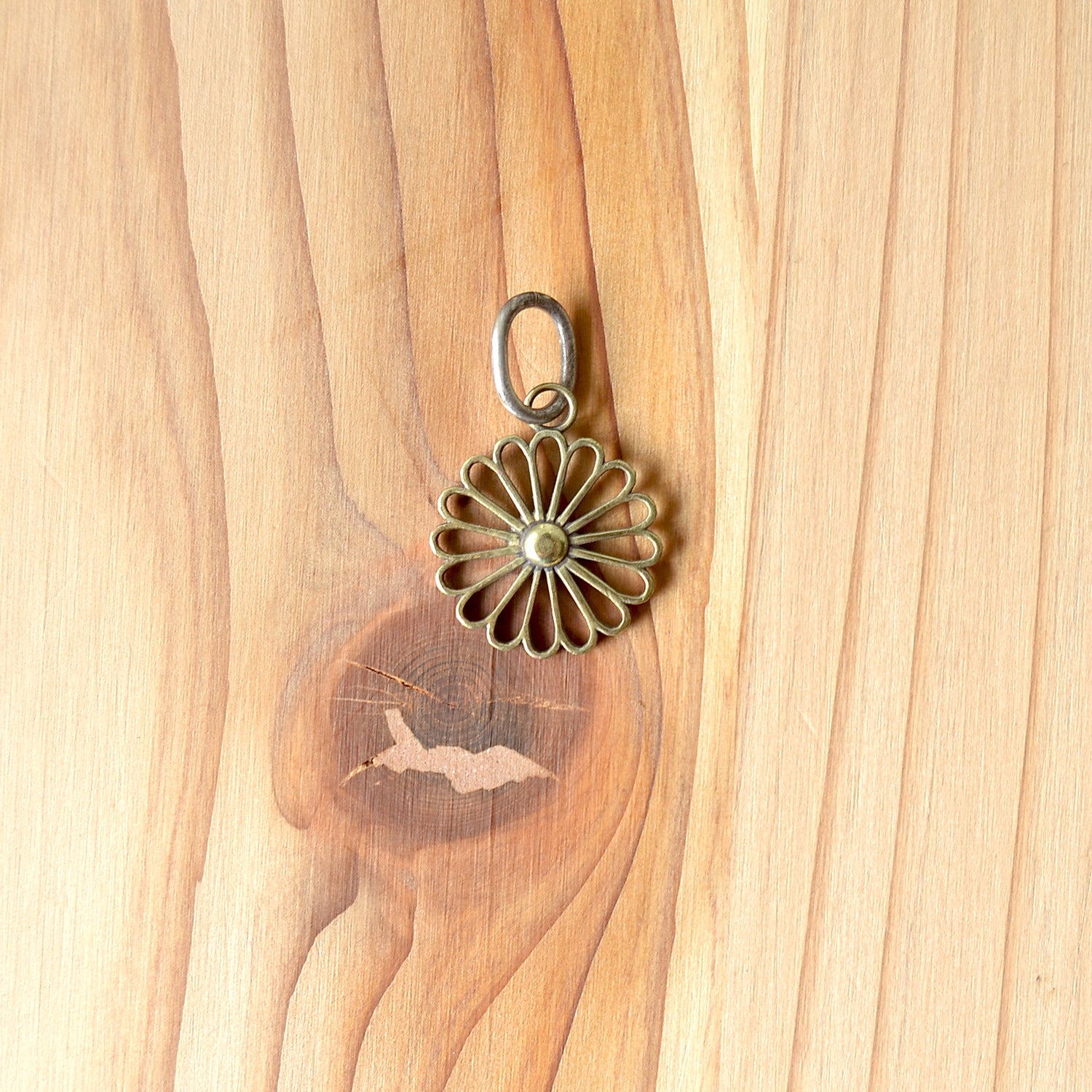 Kikumon Charm “SUKASHI” Medium Brass